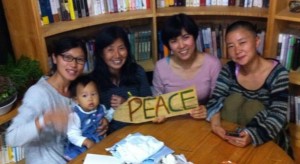Sung-Hee (third from right) shortly before going to prison, with other members of the Gangjeong International Team