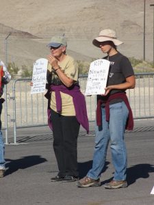 Kathy Boylan and Allison McGillivray blockade Creech drone base, photo by Felice Cohen-Joppa