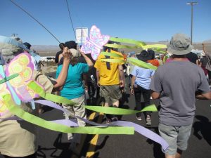 Catholic Workers process to the gate of the Nevada National Security Site (nuclear test site), photo by Felice Cohen-Joppa