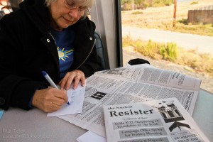 MacGregor Eddy writing to imprisoned activists during a train trip