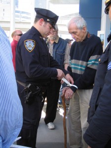 photo by Ananda Strazzini: Dan's last arrest, Good Friday, at the "USS Intrepid" Museum, 2 April 2011