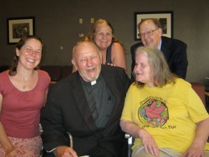 Happy after court hearing: (front, from left to right) Chrissy Kirchoefer, Father Carl Kabat, and Marsha Anderson; (back) Ann Suellentrop and Henry Stoever. (Photo by Jane Stoever)