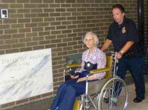Sue Clark being arrested at the Albany Federal Building. Photo by Marcia Hopple